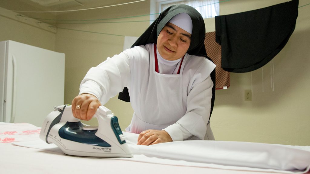 Sister ironing garments