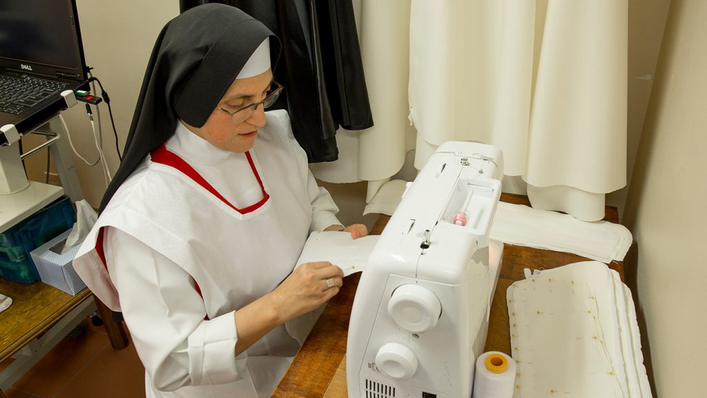Sister sewing vestments