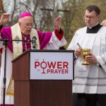 Bishop blessing the monastery